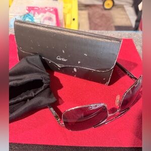 Cartier sunglasses with case. No scratches but case has wear Please see pictures